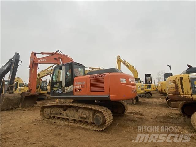 Hitachi ZX 210 Bandgrävare