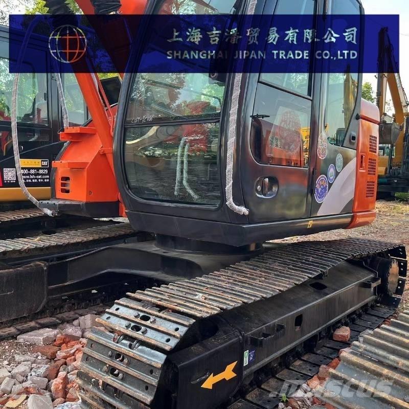 Hitachi ZX 135 Bandgrävare