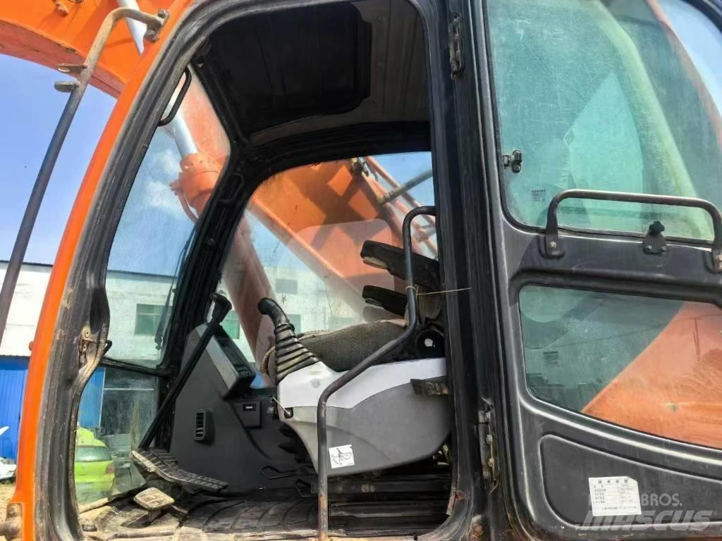 Doosan DX 260 Bandgrävare
