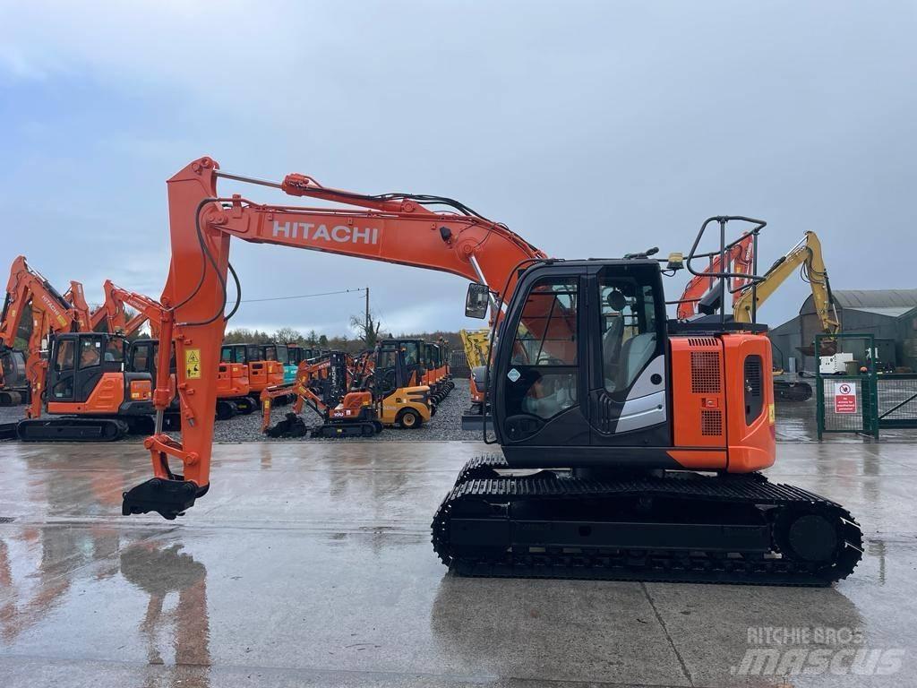 Hitachi ZX 135 US-6 Bandgrävare