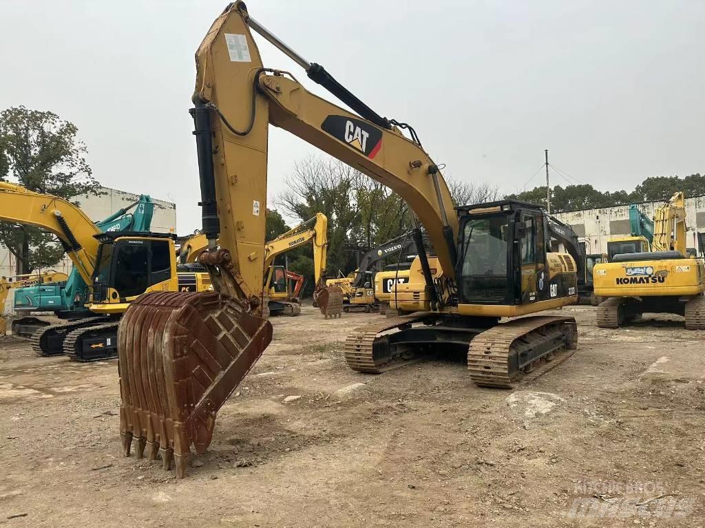 CAT 323D Bandgrävare