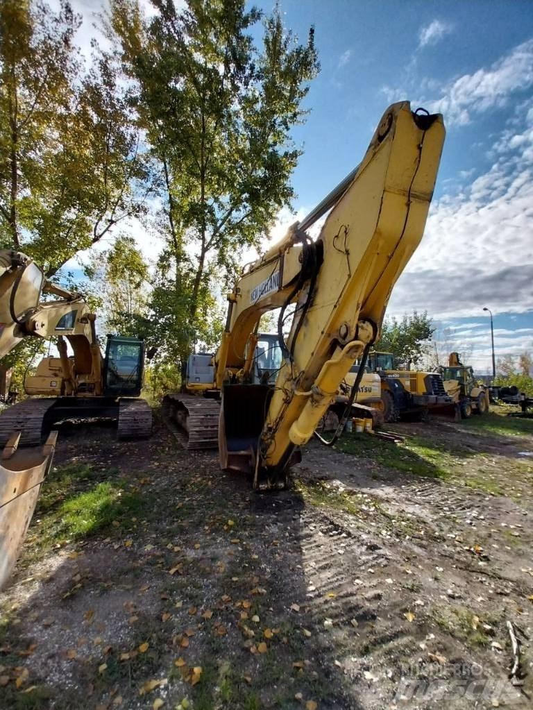 New Holland E 485 Bandgrävare