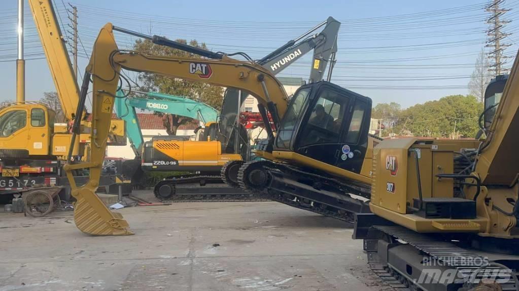 CAT 313 D Bandgrävare