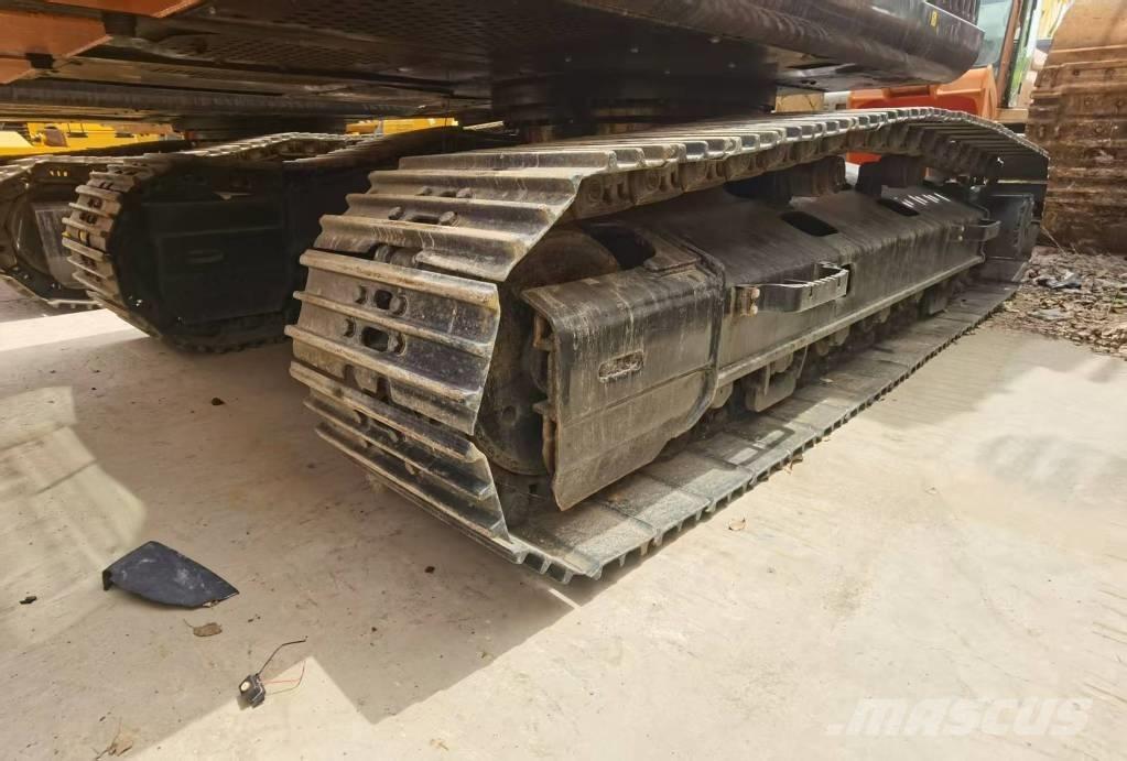 Hitachi ZX 210 Bandgrävare