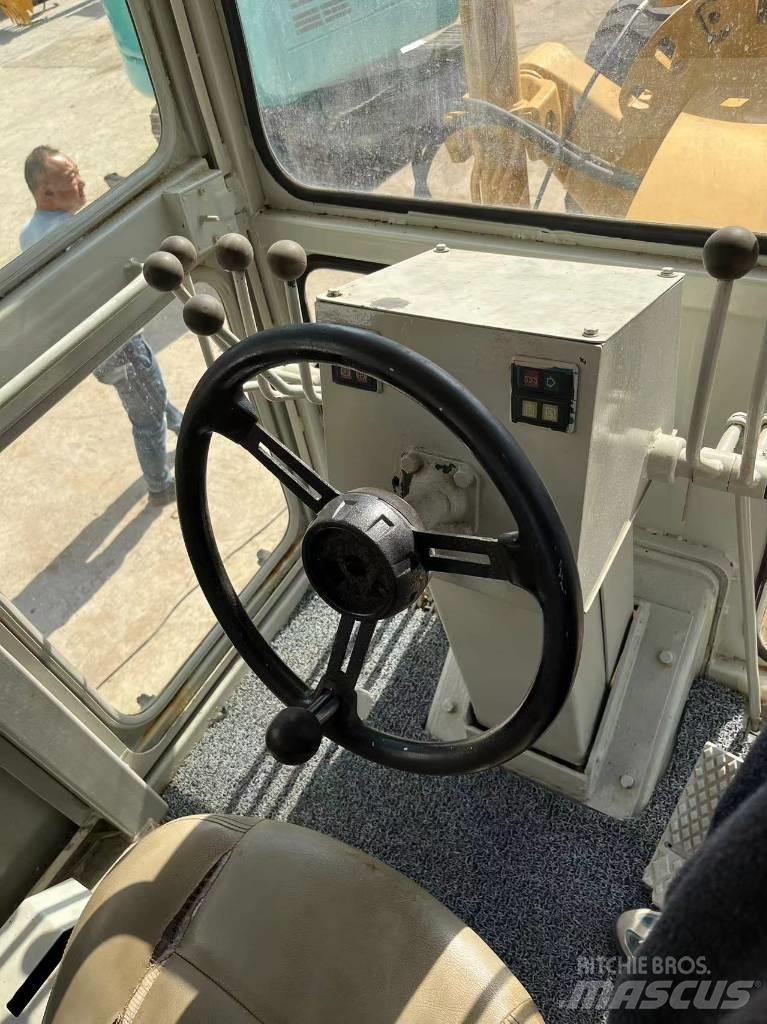 CAT 140 K Väghyvlar
