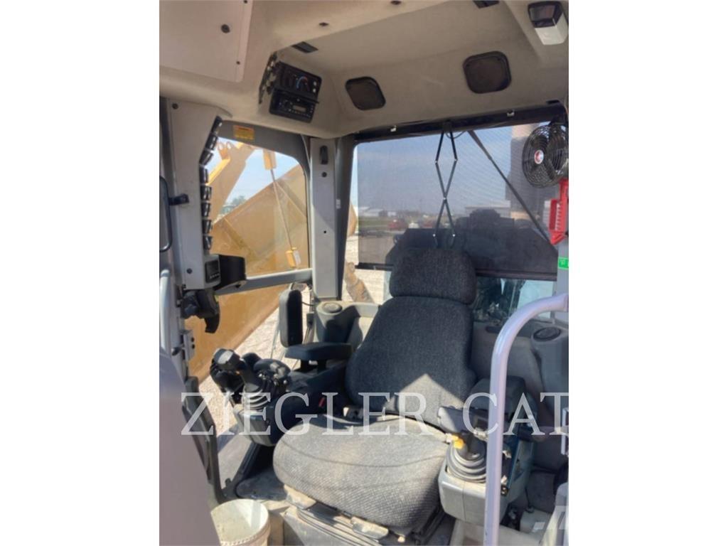 CAT 140M2 Väghyvlar