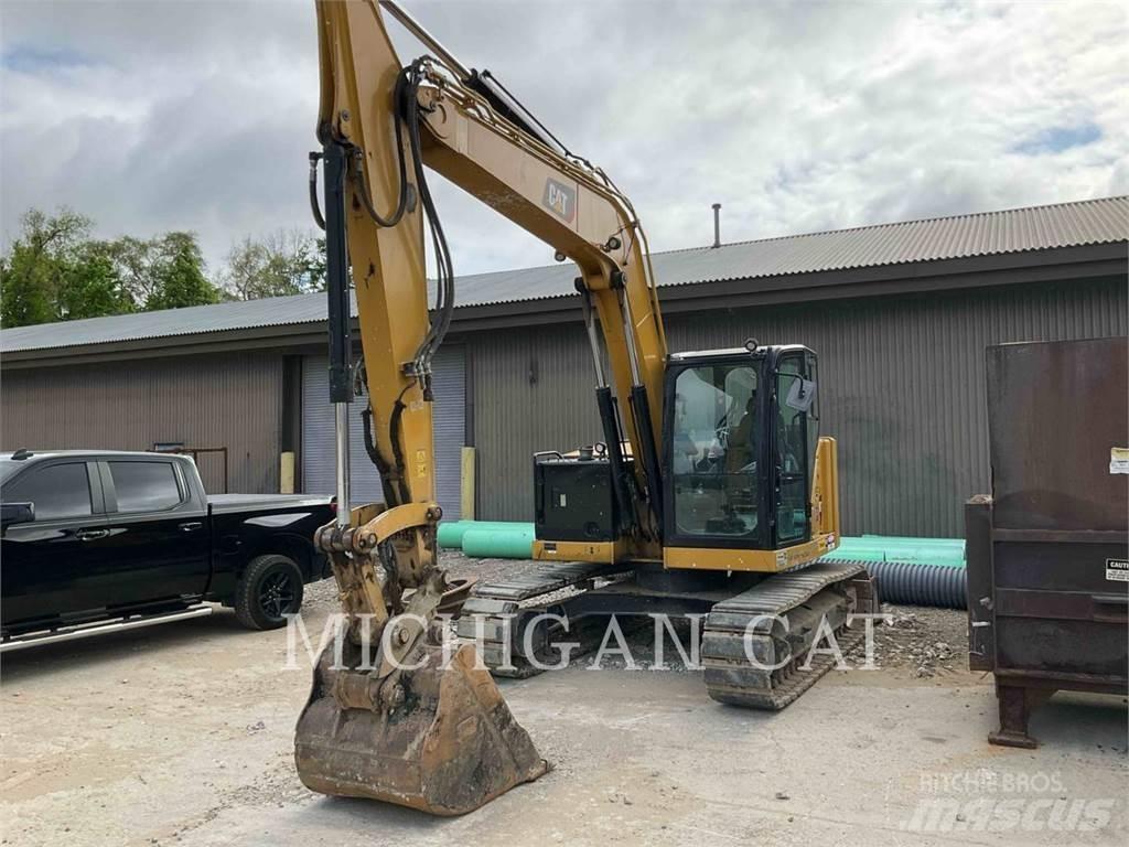 CAT 310 AQ Bandgrävare