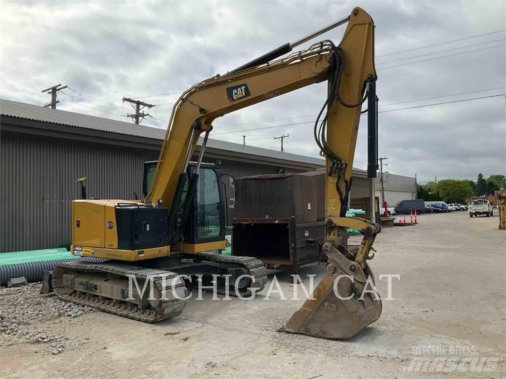 CAT 310 AQ Bandgrävare