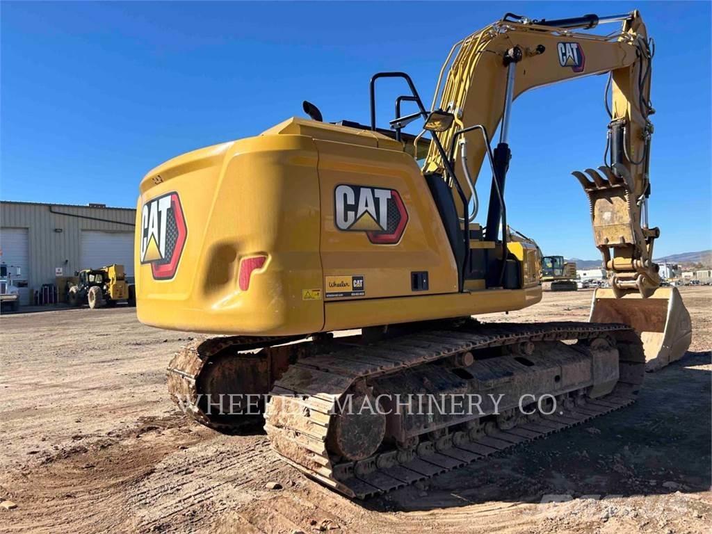 CAT 317 TH Bandgrävare