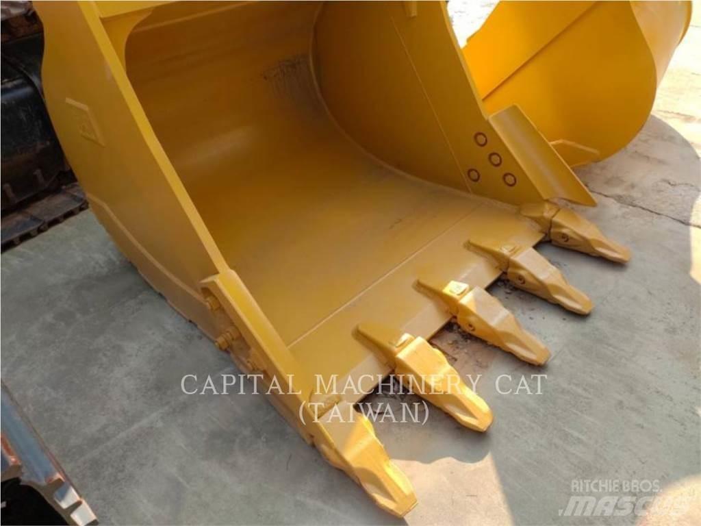 CAT 323 Skopor