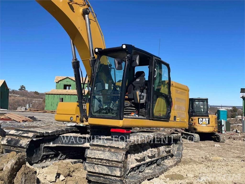 CAT 323 Bandgrävare