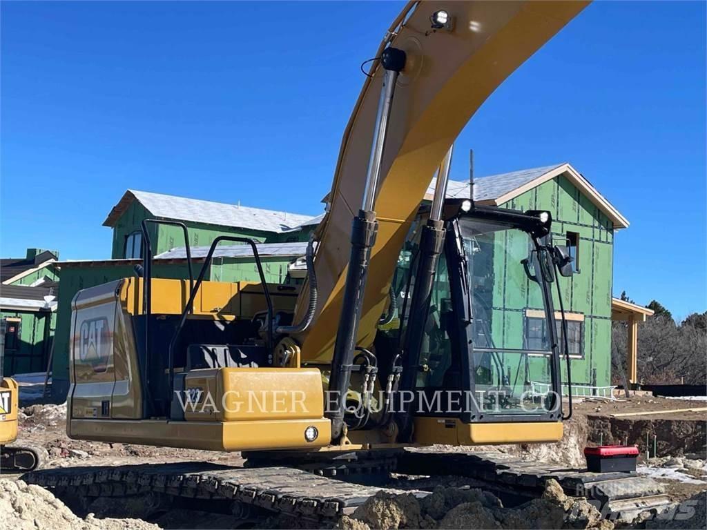 CAT 323 Bandgrävare