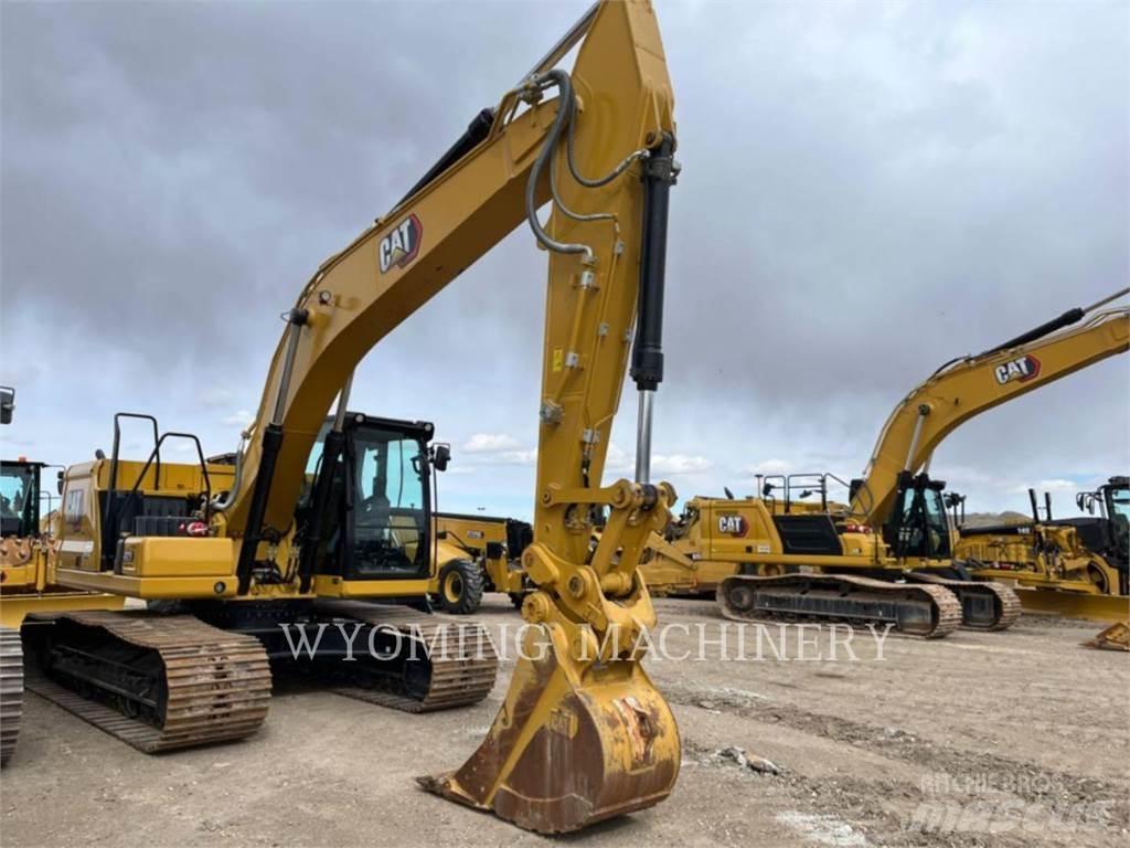 CAT 323 Bandgrävare