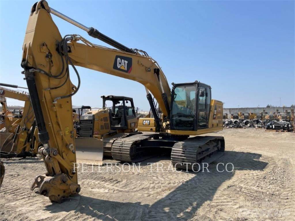 CAT 323 Bandgrävare