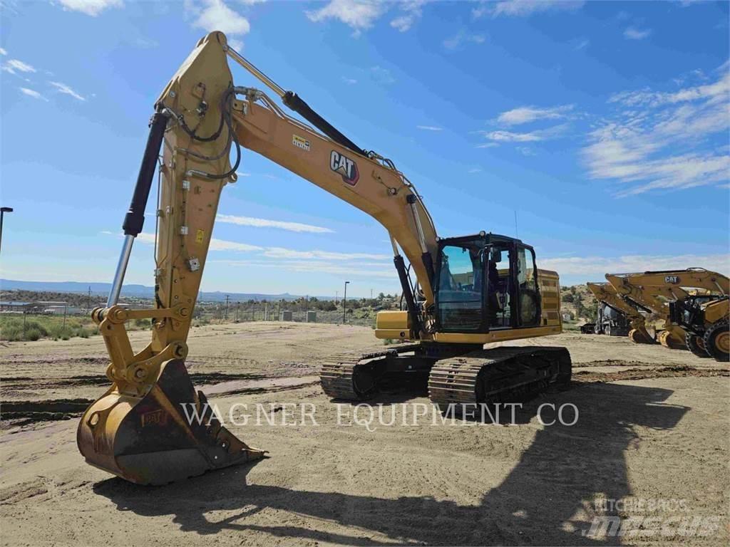 CAT 323 Bandgrävare