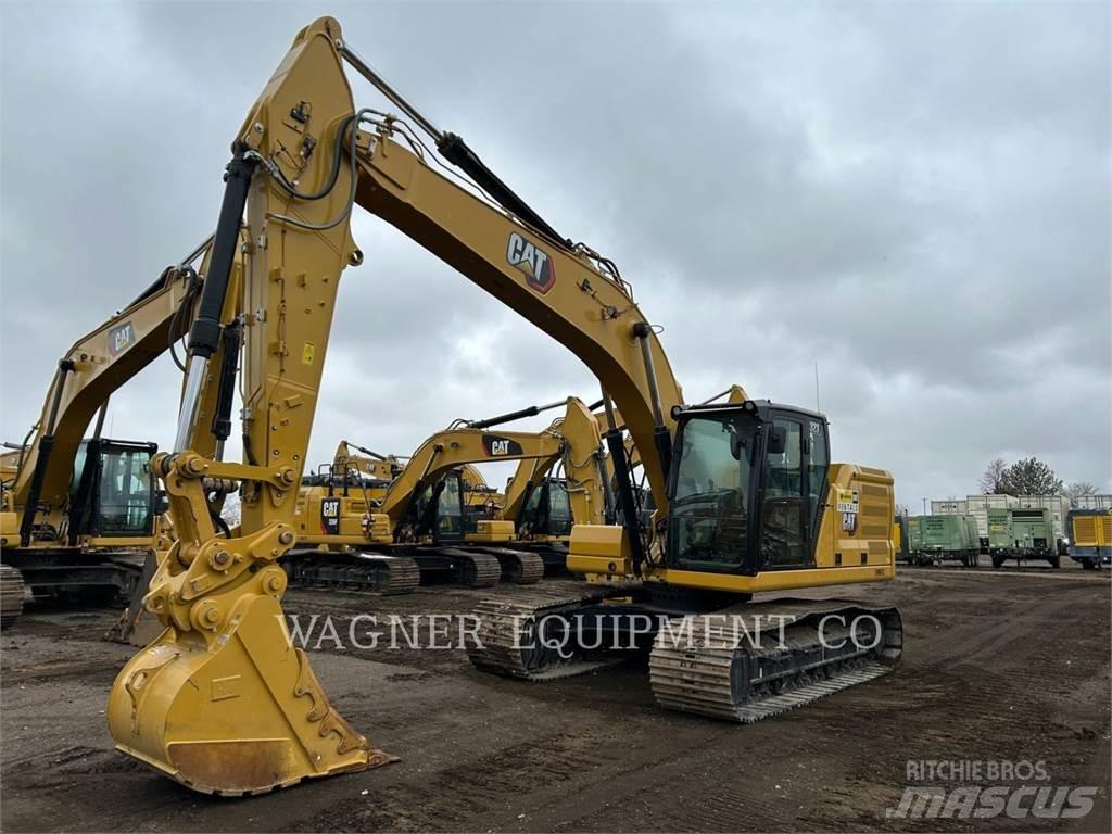 CAT 323 Bandgrävare