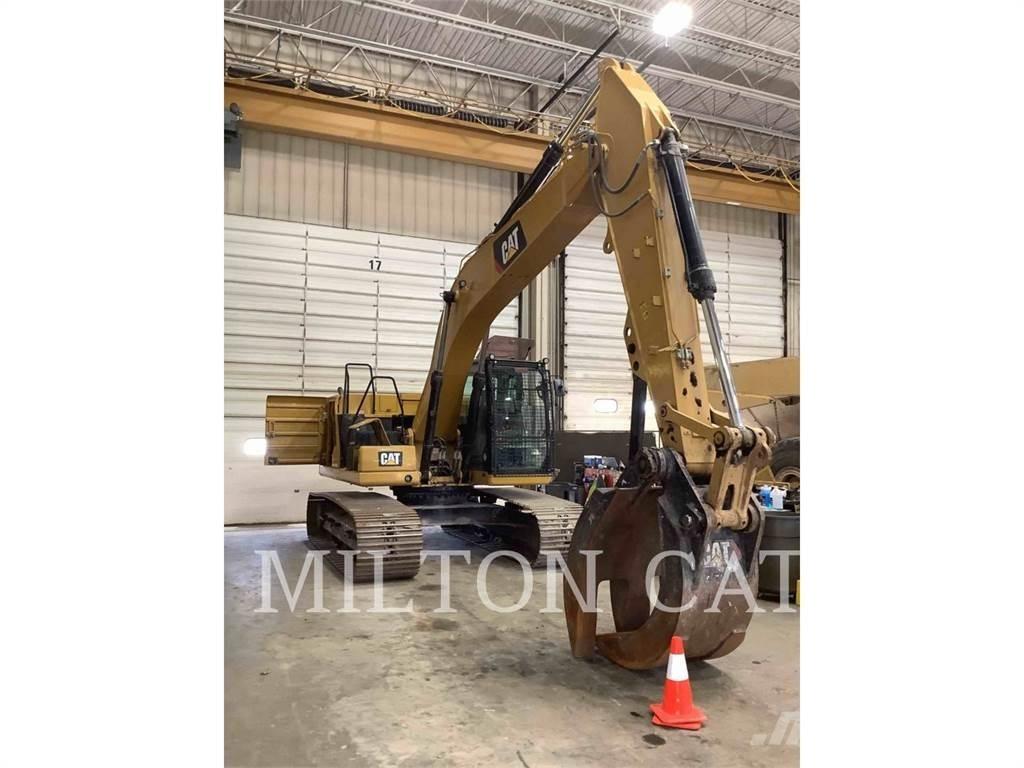CAT 323 Bandgrävare