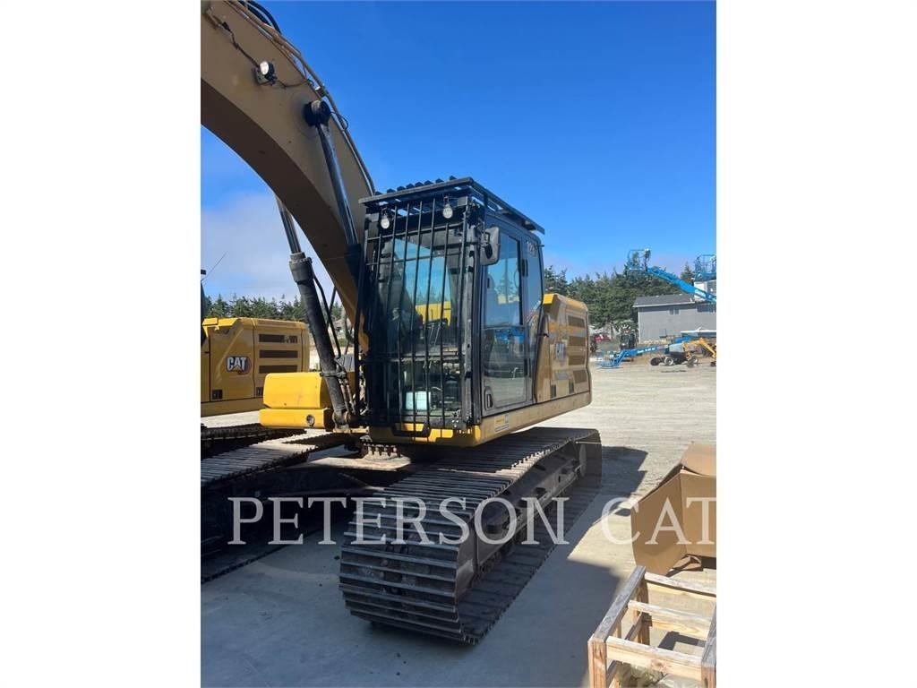 CAT 323 Bandgrävare