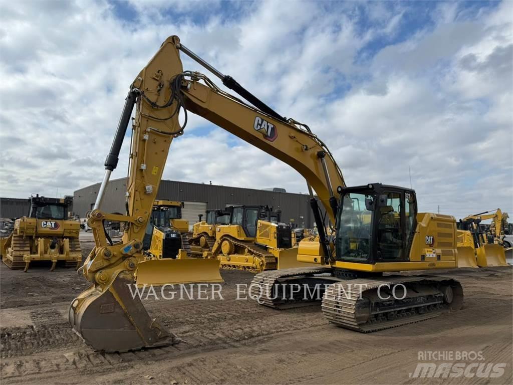 CAT 323 Bandgrävare