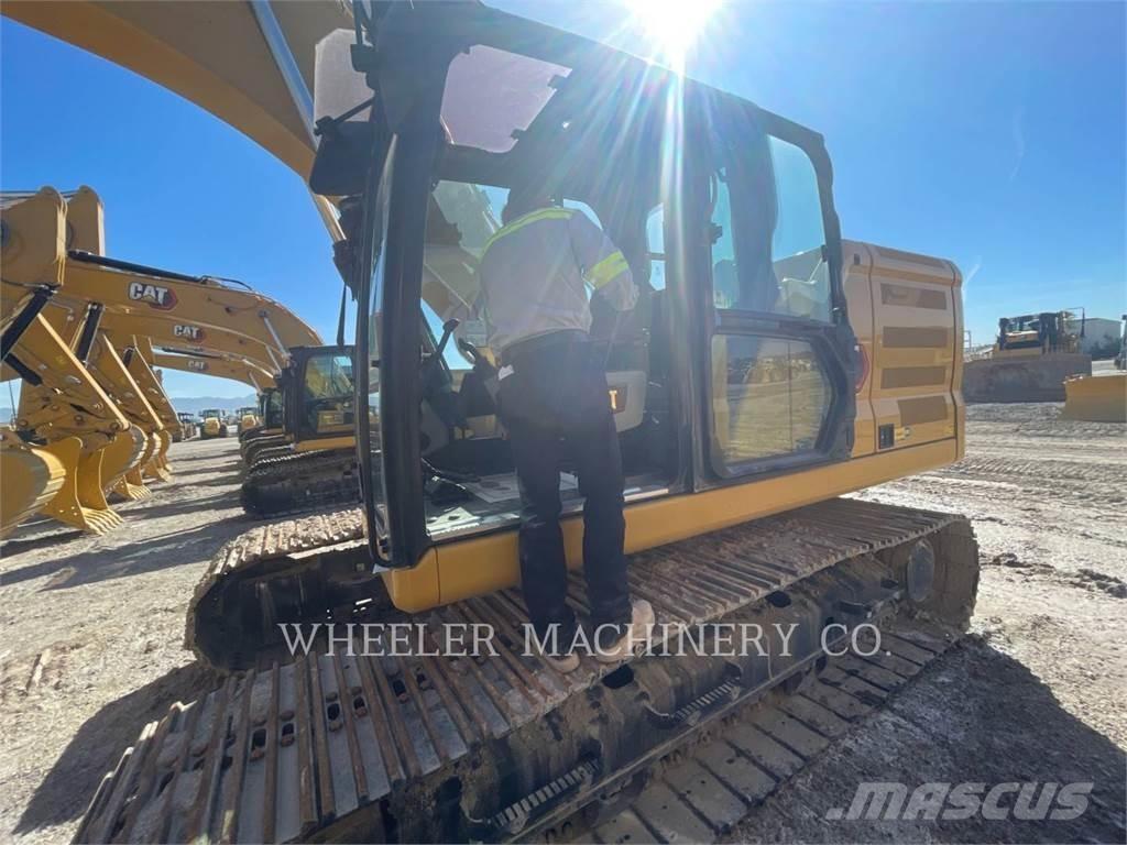 CAT 323 CF Bandgrävare