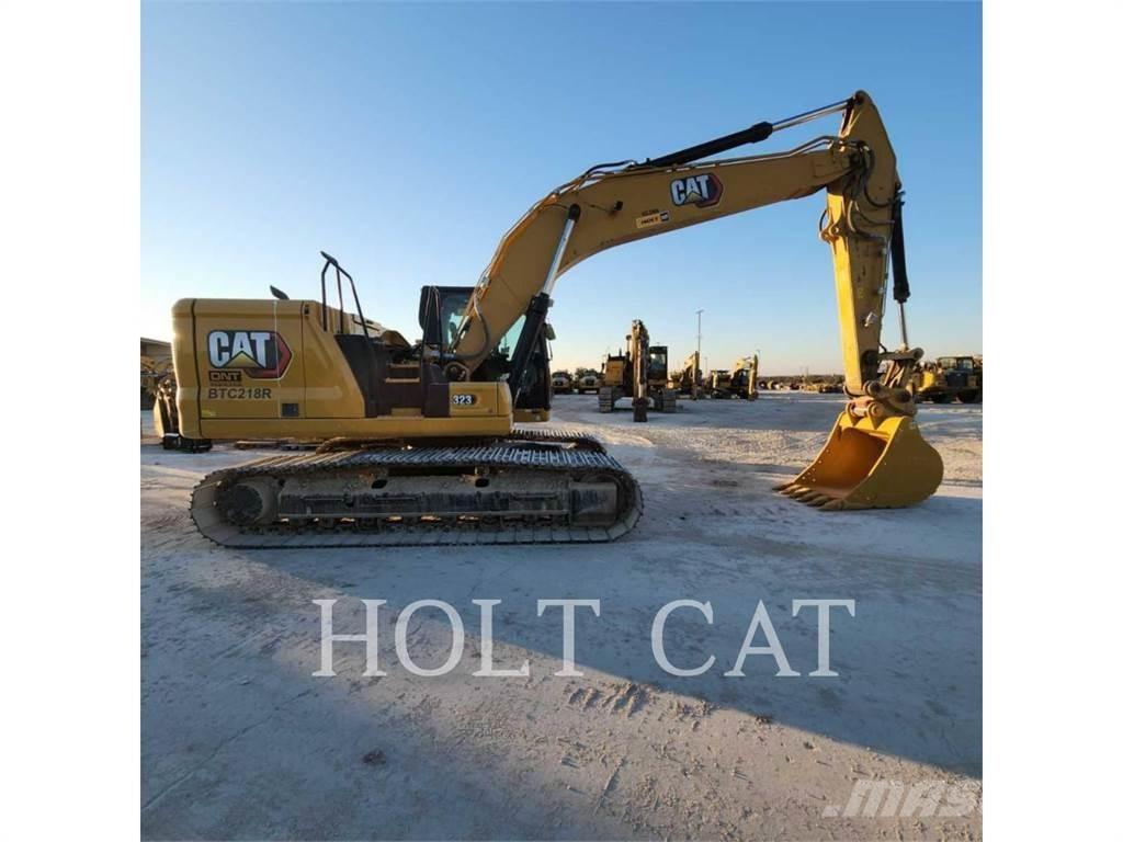 CAT 323 TC Bandgrävare
