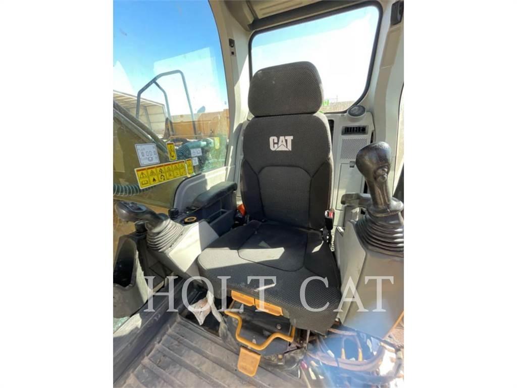 CAT 323 TC Bandgrävare