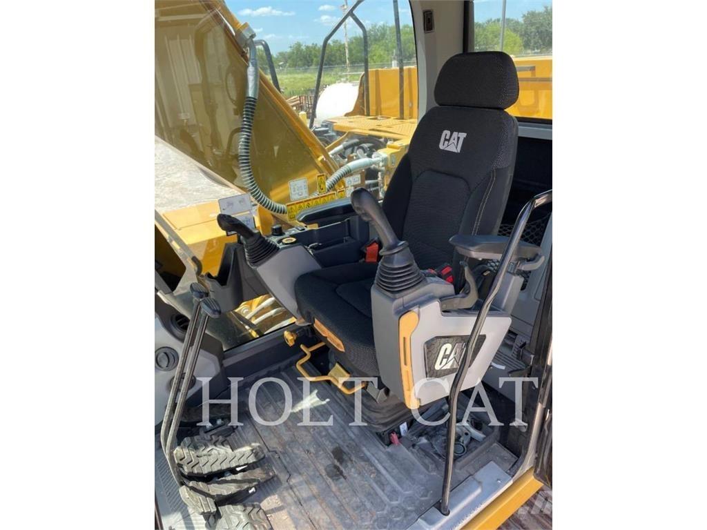 CAT 323 TC Bandgrävare