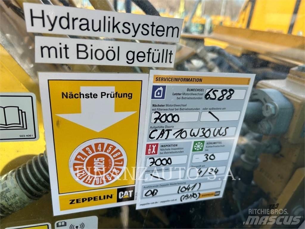 CAT 323E Bandgrävare