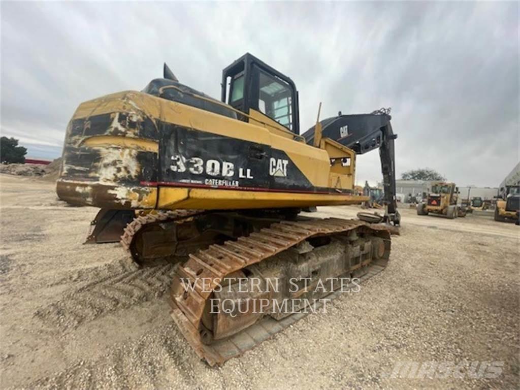 CAT 330B FM Skogstraktorer