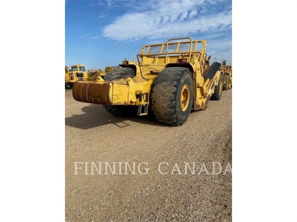 CAT 621G Schaktvagnar