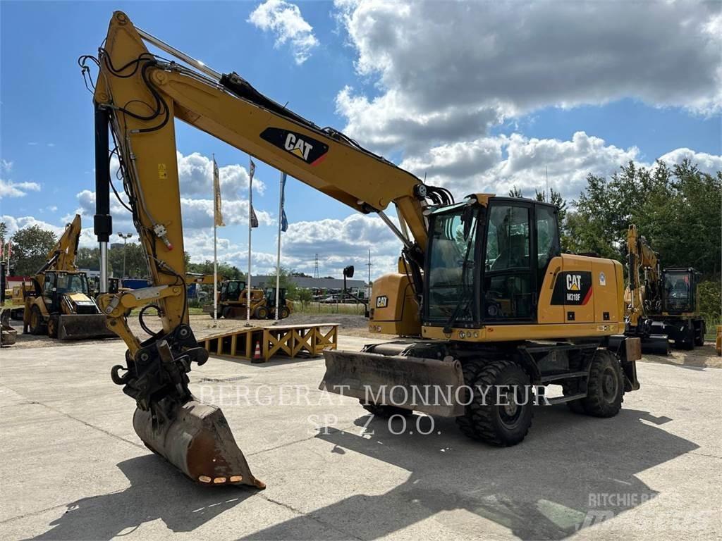 CAT M318F Hjulgrävare