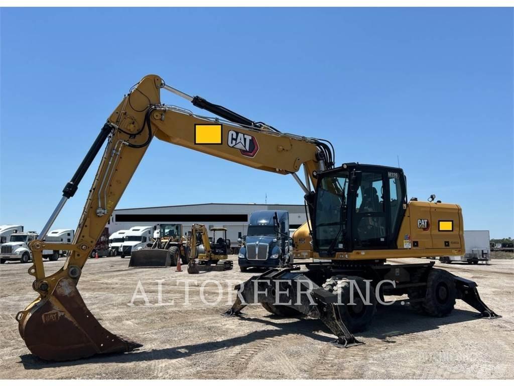 CAT M320 Hjulgrävare