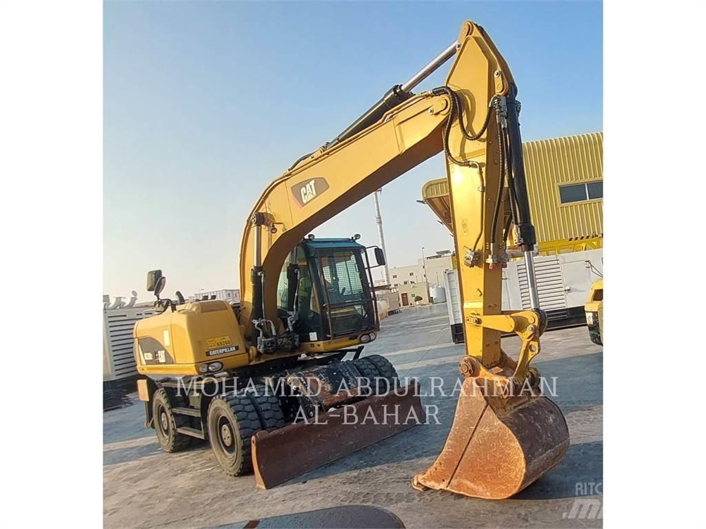 CAT M320D2 Hjulgrävare
