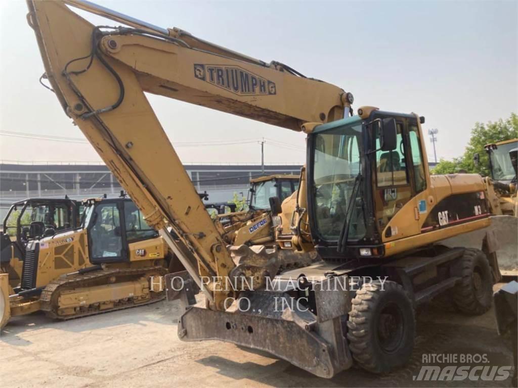 CAT M322C Hjulgrävare