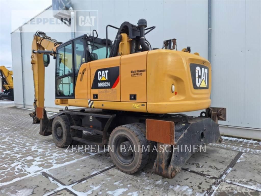 CAT MH3024-06C Rivningsgrävare