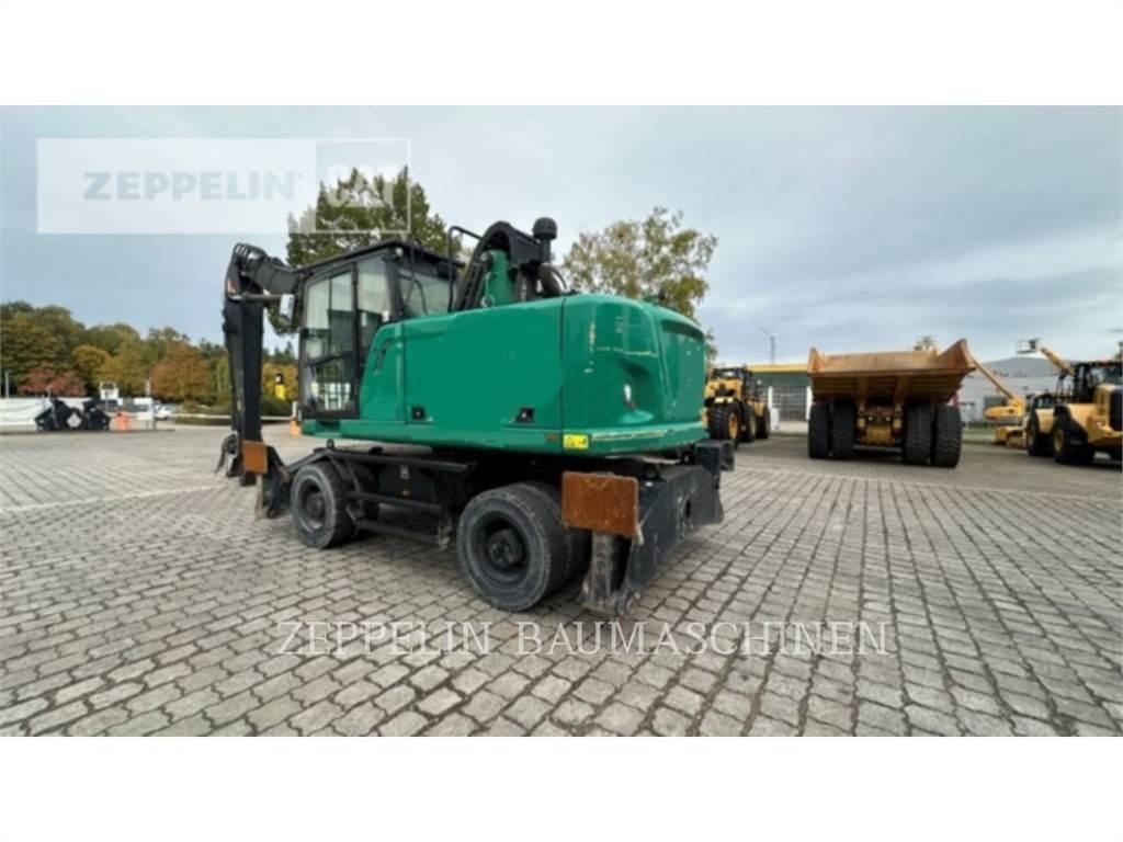 CAT MH3024-06C Rivningsgrävare