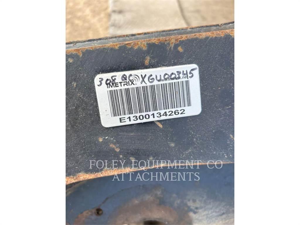 CAT QC308 Bandgrävare