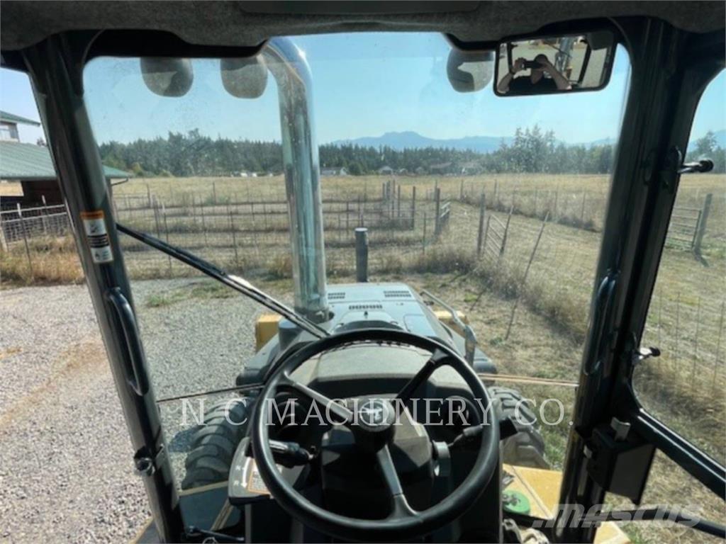 John Deere 310SL Grävlastare