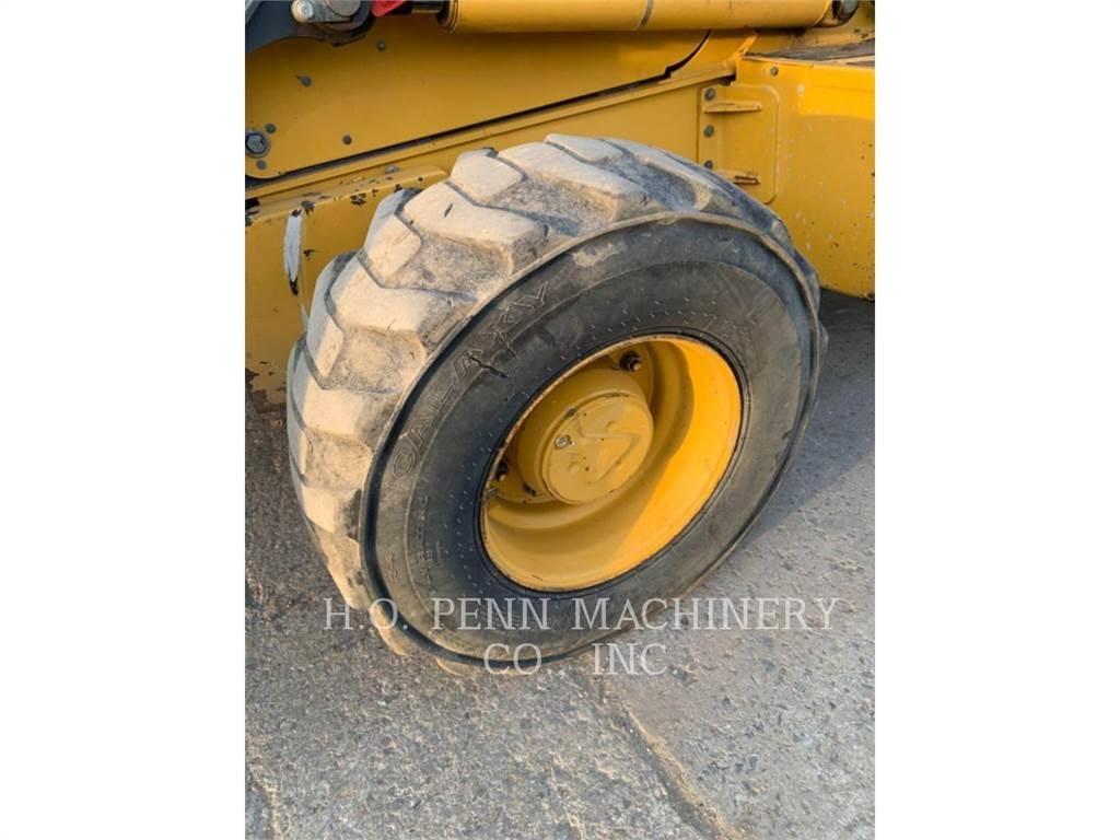 John Deere JD710D Grävlastare
