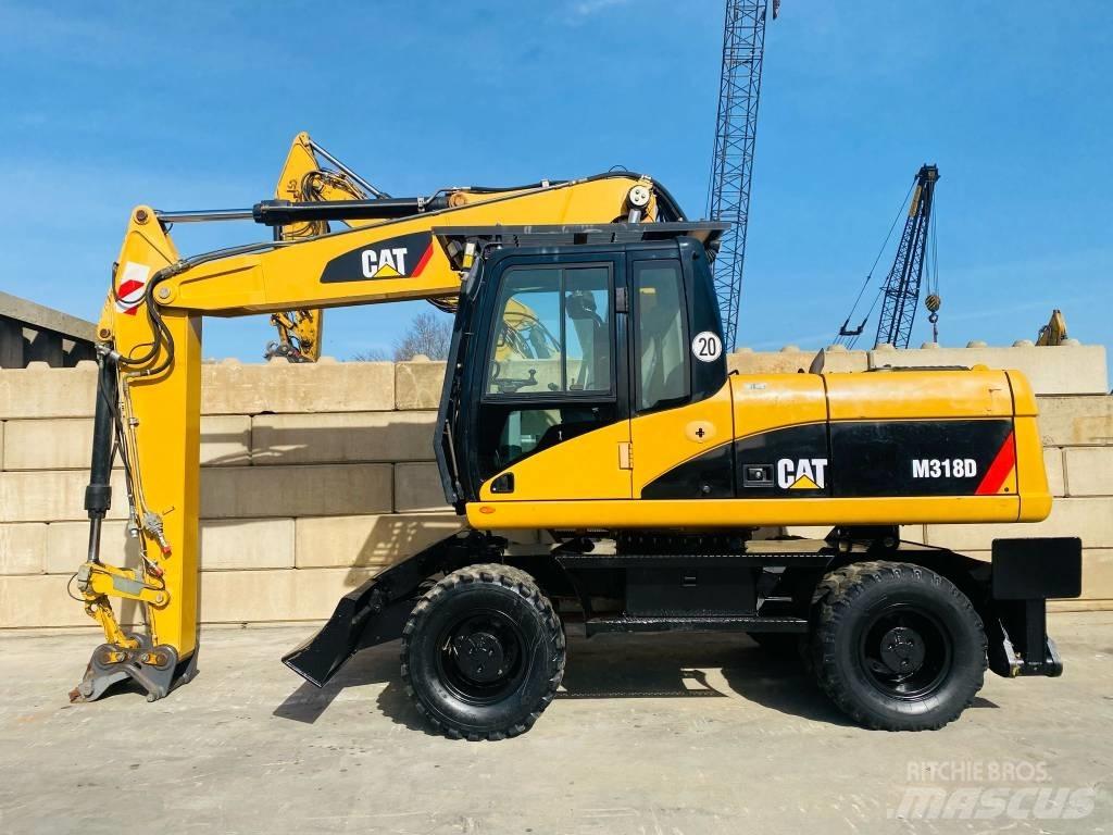 CAT M 318 D Hjulgrävare