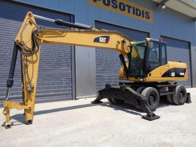 CAT M 318 D Hjulgrävare