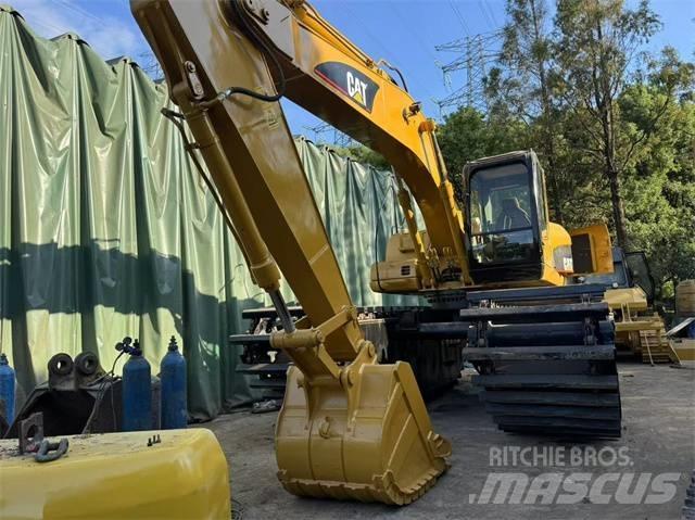 CAT 320 C Amfibiska grävmaskiner