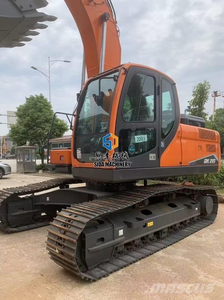 Develon DX 215 Midigrävmaskiner 7t - 12t