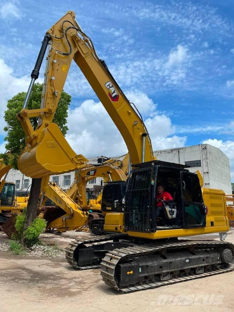 CAT 323 Midigrävmaskiner 7t - 12t