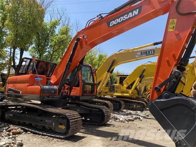 Doosan DX 225 LC Bandgrävare