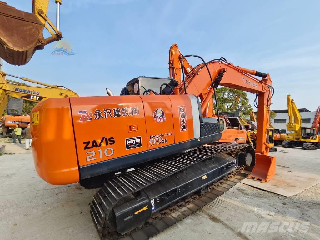 Hitachi ZX 210 Bandgrävare