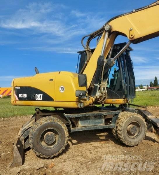 CAT M318 D Hjulgrävare