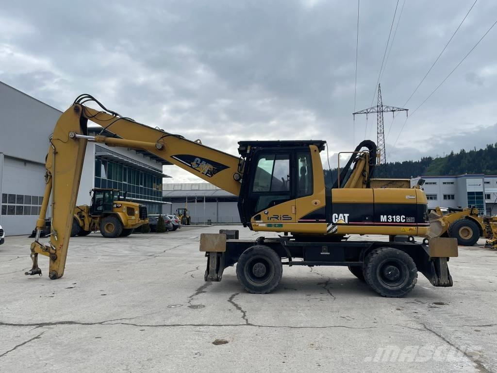 CAT M 318 C MH Avfalls / industri hantering
