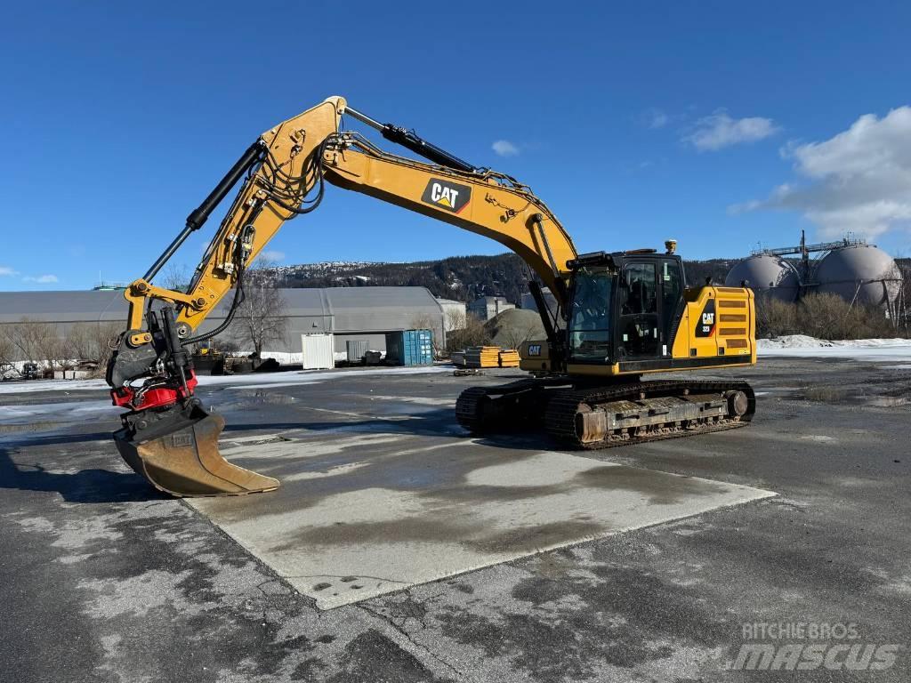 CAT 323 NG Bandgrävare