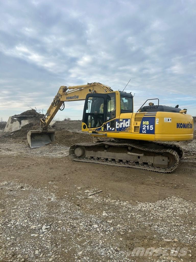 Komatsu HB 215 LC-1 Bommar och stickor